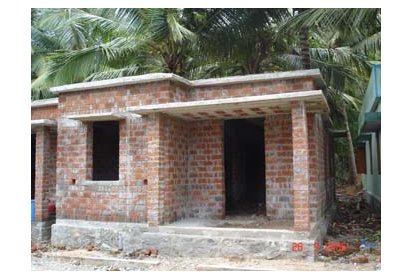 Maison au niveau des toits au coeur du village de Rajakamangalamthurai